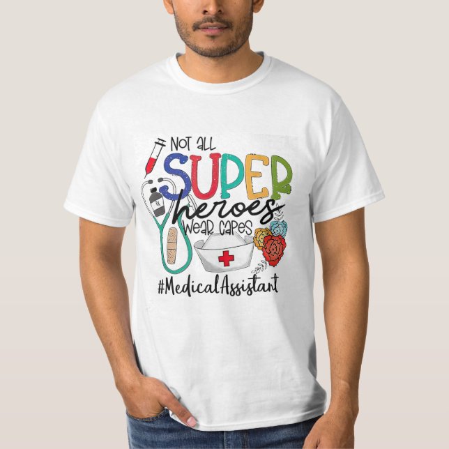 Medical Assistant not all super heroes wear capes  T-Shirt (Front)