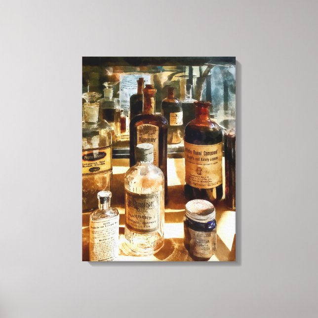 Medicine Bottles in Glass Case Canvas Print (Front)