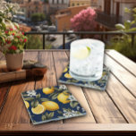 Mediterranean Lemons on Navy Italian Bar Glass Coaster<br><div class="desc">These glass coasters, adorned with the charming Italian Lemons and lush blooms and leaves on a navy background, transport you to the enchanting ambiance of an Italian bar in a sunlit piazza. With each coaster, you'll be reminded of the vibrant Mediterranean spirit, the zest of Italian life, and the joy...</div>