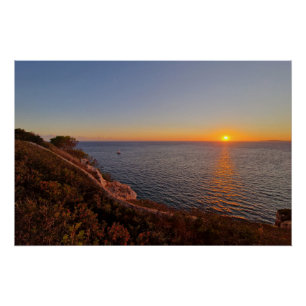 Mediterranean sunset with a boat poster
