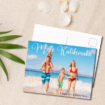 Mele Kalikimaka Family Photo Beach Cute Christmas Postcard<br><div class="desc">These pretty beach Christmas postcards feature your own summer vacation photo from the coast with an elegant typography overlay in white that reads Mele Kalikimaka. A cute Hawaiian way to say Merry Christmas in style on a tropical island. Take me to the ocean with this holiday postcard.</div>