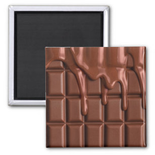 Melted chocolate dripping over a chocolate block magnet