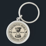 Memento mori memento vivere key ring<br><div class="desc">Memento mori is a Latin phrase meaning 'remember you must die'The basic idea of this philosophy is that if people remember their inescapable deaths, they will lead more sober lives, live in the present, and take advantage of opportunities rather than postpone them 'til “tomorrow.” All of which are mostly good...</div>