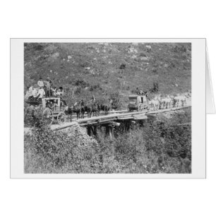 Men on Wagon Wave and Tip Hats to Photographer