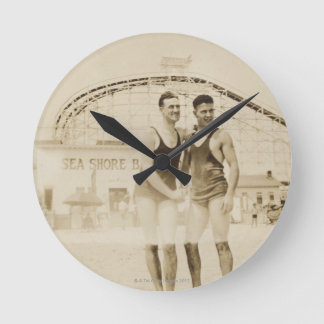 Men Standing on Beach Round Clock