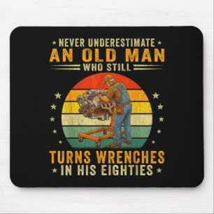 Men turn wrenches in eighties 80s funny mechanic mouse mat