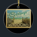 Mendocino Beach Vintage Travel Ceramic Tree Decoration<br><div class="desc">This Greetings From Mendocino vintage postcard design features a sandy beach with a beautiful turquoise ocean water and above the sea,  a blue sky with billowy white clouds. In vintage travels style.</div>