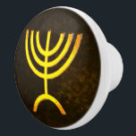 Menorah Flame Ceramic Knob<br><div class="desc">A brown and gold digital rendering of the Jewish seven-branched menorah (Hebrew: מְנוֹרָה‎). The seven-branched menorah, used in the portable sanctuary set up by Moses in the wilderness and later in the Temple in Jerusalem, has been a symbol of Judaism since ancient times and is the emblem on the coat...</div>