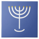 Menorah White Gold Blue Tile<br><div class="desc">Menorah white gold blue tile. Personalise by adding your own name. To make this your own design 'Click to Customise Further" … or 'Transfer this design' to print the same design onto a different product. Where does the Menorah come from? It comes from the Bible, in the book of Exodus,...</div>