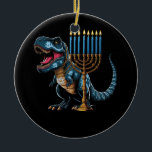 Menorasaurus Rex Trex Dinosaur Hanukkah Menorah Je Ceramic Tree Decoration<br><div class="desc">Fun cute dino who love history and dinosaurs! Makes a great tee for anyone who loves dinosaurs, t rex, stegosaurus, triceratops, brontosaurus, tyrannosaurus rex! What a great tee for girls who loves dinosaurs! Dinosaur Dino tee, Dinosaur lover. Hanukkah is a Jewish festival commemorating the rededication of the Second Temple It...</div>