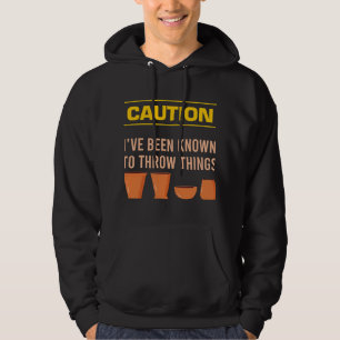Mens Caution Ive Been Known To Throw Things Clay S Hoodie