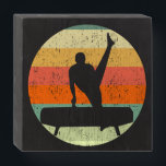 Mens Gymnastics Male Gymnast at Sunset Wooden Box Sign<br><div class="desc">Mens Gymnastics Boys Team Sunset. Strong male gymnast on a pommel horse in front of a cool retro sunset image.</div>