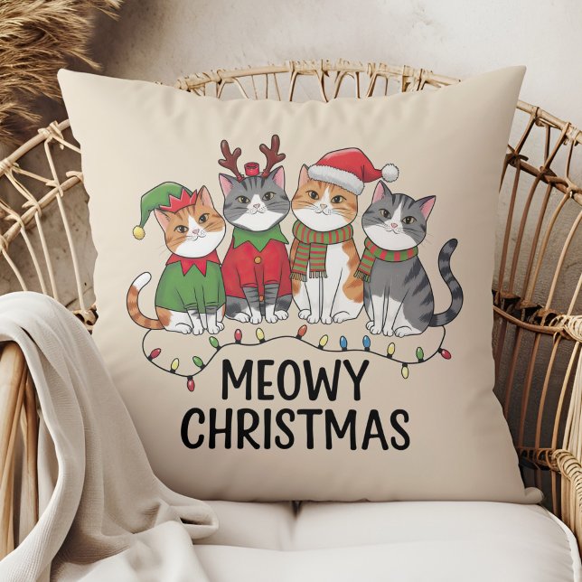 Meowy Christmas Funny Cats - Cute Holiday  Cushion (Meowy Christmas Funny Cats - Cute Holiday Throw Pillow in a boho rattan armchair.)