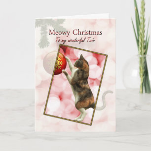 Meowy Christmas with a playful cat. Holiday Card