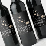Merriest Christmas Black Wine Label<br><div class="desc">The words Merriest Christmas in retro vintage lettering,  a white sketch tree with faux gold foil ornaments and gifts are featured on these black wine bottle labels personalised with your family name. Stylish for any Christmas holiday occasion or give as a gifts. MATCHING items in our store.</div>