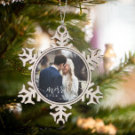 Merrily Ever After | Wedding Photo Snowflake Pewter Christmas Ornament<br><div class="desc">Festive holiday design features your favourite wedding photo with "merrily ever after" in a chic combo of white modern calligraphy script and block typefaces. Personalise with the year for a beautiful keepsake of your wedding.</div>