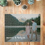 Merry and Bright | Modern Christmas Couple Photo Jigsaw Puzzle<br><div class="desc">A stylish modern holiday photo jogsaw puzzle with a bold retro typography quote "merry & bright" in white. The greeting, name and message can be easily customised for a personal touch. A trendy, minimalist and contemporary design to stand out this holiday season! The image shown is for illustration purposes only...</div>