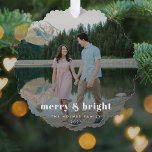 Merry and Bright | Modern Christmas Couple Photo Tree Decoration Card<br><div class="desc">A stylish modern holiday photo ornament with a bold retro typography quote "merry & bright" in white. The greeting, name and year can be easily customised for a personal touch. A trendy, minimalist and contemporary design to stand out this holiday season! The image shown is for illustration purposes only to...</div>