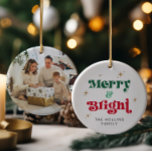 Merry and Bright Photo Christmas Ornament Retro<br><div class="desc">A stylish holiday photo ornament that features the bold typography quote "merry and bright" in a red and green retro font. You can personalise it with your name(s) and with your own photo on the reverse side. Pair with anything in the ROXY collection for a cohesive look.</div>