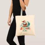 Merry Beachmas Santa Surfing Retro Design Tote Bag<br><div class="desc">Merry Beachmas,  Santa surfin',  colourful retro typography,  Christmas in July design.</div>
