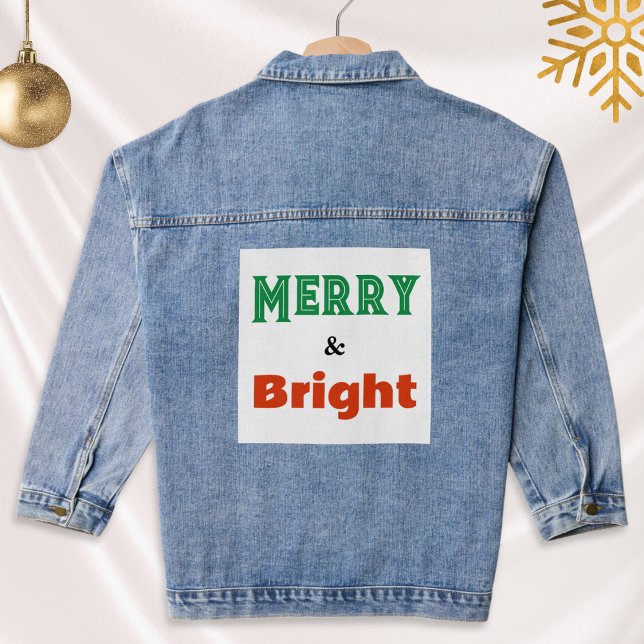 Merry & Bright Christmas Festive Colourful Stylish Denim Jacket (A festive denim jacket with 'Merry & Bright' caption on the back panel, in green and red)
