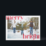 Merry Bright Festive Red Typography Fun Two Photo Holiday Card<br><div class="desc">Spread holiday cheer with this fun and festive Christmas card featuring bold red typography for the words Merry and Bright. With two photos, one on each side of the card, and modern lettering, this card captures a joyful and trendy aesthetic. Perfect for sharing your favourite moments with loved ones, this...</div>