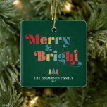 Merry & Bright Retro Colourful Christmas Ceramic Ornament<br><div class="desc">This square Christmas tree ornament features the text "Merry & Bright" in a vibrant,  retro  style. The 1970s style text stands out against a dark green background,  creating a visually striking contrast.  Personalise this holiday ornament with your name and year. Photography © Storytree Studios,  Stanford,  CA</div>