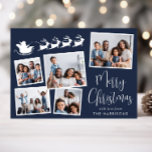 Merry Christmas 5 Photo Santa Sleigh Blue Holiday Card<br><div class="desc">Festive blue holiday card featuring a 5 photo collage of scattered pictures in white frames,  a white silhouette of reindeers flying Santa's sleigh,  "Merry Christmas" in a stylish white script and your name in simple modern white typography.</div>