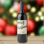 Merry Christmas Black & Pearl, Name on Set of 6 Wine Label<br><div class="desc">Elegant black brush script, Merry Christmas, on a pearl colour background, greeting and family or personal names. Perfect bottle label for gifting a bottle of wine during the holidays... for a party hostess, neighbour, boss, family or to have on hand for an impromptu get-together at home. You will receive six...</div>