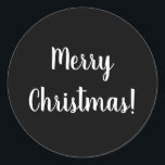 Merry Christmas Black & White Typography Classic Round Sticker<br><div class="desc">Cool and stylish black and white Merry Christmas design. This design has the festive message “Merry Christmas!” In modern white typography text on a black background. Perfect for envelope seals or for the finishing touch to your gifts or favour bags. If you wish to change the message you can do...</div>