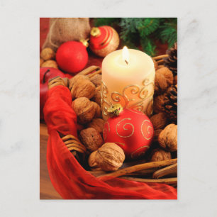 Merry Christmas. candle with walnuts. Holiday Postcard
