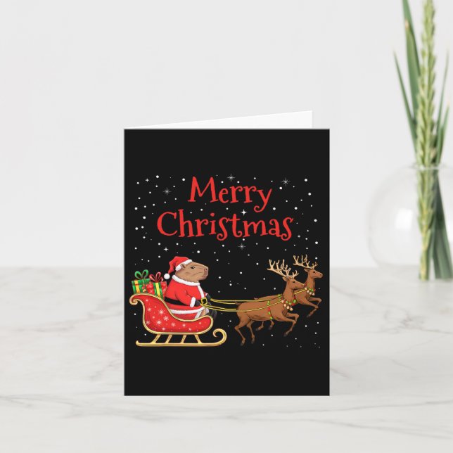 Merry Christmas Capybara Riding Santa Sleigh With  Card (Front)