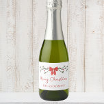 Merry Christmas Chic Coquette Red Bow Personalised Sparkling Wine Label<br><div class="desc">Celebrate the holidays in style with these customisable mini champagne bottle labels, featuring a festive red bow, elegant greenery, and personalised text. Perfect for Christmas party favours, holiday gifts, or adding a personal touch to your seasonal celebrations, these labels bring charm and sophistication to your holiday cheer. Ideal for family...</div>