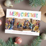 Merry Christmas cute bright fun four photo Holiday Card<br><div class="desc">Merry Christmas! This merry and bright colourful four-photo Christmas card design is the perfect way to send cheer this year. With its playful type, this holiday photo card is perfect for families, but also works well for couple holiday cards, pet holiday cards and more. The back is a coordinating trendy...</div>