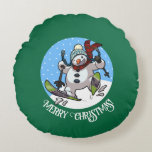Merry Christmas! Editable Text Skiing Snowman Round Cushion<br><div class="desc">Make somebody's home cosy and festive this Christmas with a round pillow or cushion, featuring a cartoon of a jolly snowman with a carrot nose and coal eyes, dashing through the snow on skis, in woolly winter hat and tartan scarf. Use "Personalise this template" to change the "Merry Christmas!" text...</div>