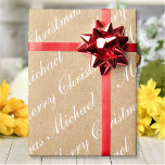 Merry Christmas Elegant Script Text Kraft Style Wrapping Paper<br><div class="desc">Customise the text, and easily create your personalised wrapping paper. Click CUSTOMIZE FURTHER to change the text colour. You can TRANSFER this DESIGN on other Zazzle products and adjust it to fit most of the Zazzle items. Standard Studio designs are made in high-resolution vector graphics for a professional print. Thank...</div>