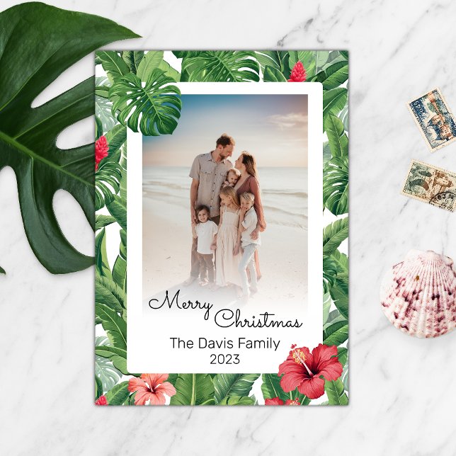Merry Christmas Family Photo Tropical Flower Leaf  Holiday Card (A tropical green leaf and red flower Christmas card to personalize with your family photo.)