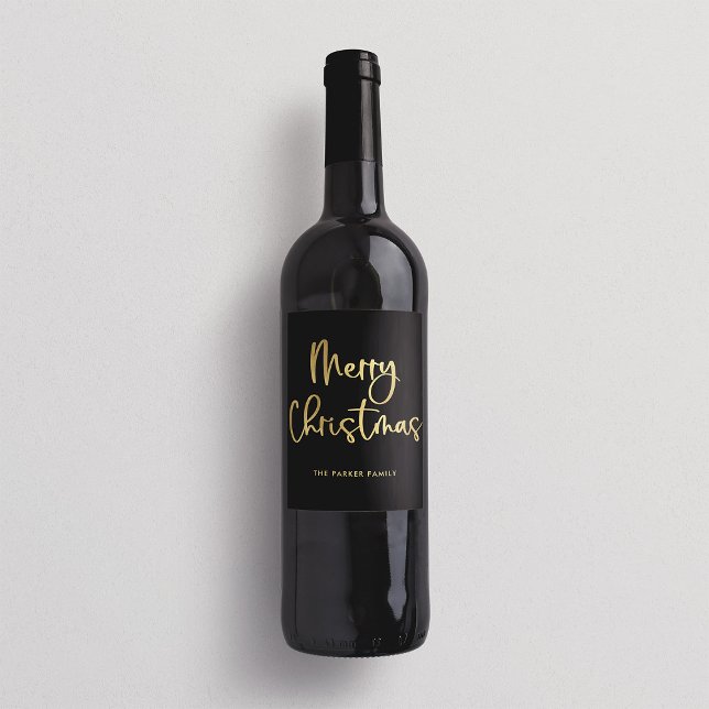 Merry Christmas | Faux Gold Casual Script on Black Wine Label (An elegant holiday wine label with faux gold text on black)