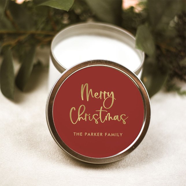 Merry Christmas | Faux Gold on Red Casual Script Classic Round Sticker (An elegant red holiday sticker that says "Merry Christmas" in gold script)