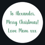 Merry Christmas from Mum green minimal Classic Round Sticker<br><div class="desc">This is a minimal Christmas gift tag label in festive green and white. It has the message Merry Christmas Love Mum xxx in stylish typography script. To personalise, simply change the name Alexander to your loved one's name in the personalise this text box. Want to make more changes? All of...</div>