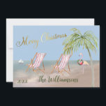 Merry Christmas From the Beach Palm Tree Flamingo Card<br><div class="desc">Merry Christmas on this lovely Watercolor Beach -- peaceful and gentle scene with two beach chairs -- friendly flamingo with lovely wreath -- Palm tree with a few ornaments. Also available in different paper weights -- your selection. Any design questions just send a chat or an email to charmdesignstudio@rcn.com and...</div>