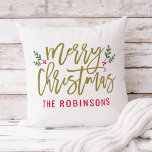 Merry Christmas Gold Modern Custom Family Cushion<br><div class="desc">Seasonal pillow design features a modern antique gold script "Merry Christmas" with red custom text that can be personalized with your last name. Green branches of holly leaves and red berries accent the design. White background color.</div>