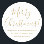 Merry Christmas gold white script return address Classic Round Sticker<br><div class="desc">Merry Christmas gold and white modern custom script calligraphy name and address personalised Christmas return address stickers.
Fully customisable faux gold text,  white background.
Elegant,  simple,  modern design.</div>