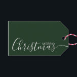 Merry Christmas Green White Minimalist Gift Tags<br><div class="desc">This minimalist and elegant gift tag features white Merry Christmas text on the front side and on the back side personalise it with your name or family name. The background is in green colour.</div>
