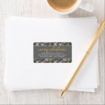 Merry Christmas Grey Gold Elegant Script Address Label<br><div class="desc">"Merry Christmas" holiday return address labels feature a watercolor floral pattern of holiday greenery leaves and berries design with modern elegant gold script greeting text and classic return address text that can be personalised with your family name and home address. Includes a dark charcoal grey background colour.</div>