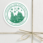 Merry Christmas Happy Holidays Winter Personalised Classic Round Sticker<br><div class="desc">Merry Christmas Happy Holidays Winter Personalised Name Stickers Labels features the text "Merry Christmas and Happy Holidays" in modern green script and personalised with your name surrounding a home with Christmas trees and snowflakes. Perfect for Christmas party favours and Holiday gifts or in the office for products or mail. Designed...</div>