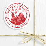 Merry Christmas Happy Holidays Winter Personalised Classic Round Sticker<br><div class="desc">Merry Christmas Happy Holidays Winter Personalised Name Stickers Labels features the text "Merry Christmas and Happy Holidays" in modern red script and personalised with your name surrounding a home with Christmas trees and snowflakes. Perfect for Christmas party favours and Holiday gifts or in the office for products or mail. Designed...</div>