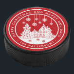Merry Christmas Happy Holidays Winter Personalised Hockey Puck<br><div class="desc">Merry Christmas Happy Holidays Winter Personalised Name Hockey Puck features the text "Merry Christmas and Happy Holidays" in modern white script on a red background and personalised with your name surrounding a home with Christmas trees and snowflakes. Perfect for Christmas party favours and Holiday gifts. Designed by ©Evco Studio www.zazzle.com/store/evcostudio...</div>