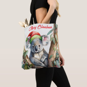 Merry Christmas Koala sitting in Gumtree Tote Bag