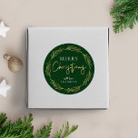 Merry Christmas Label Holly Wreath Faux Gold Foil<br><div class="desc">Finish off your Christmas packaging and gift wrapping with a personalised faux gold foil Merry Christmas stickers. This luxurious Holly Wreath Christmas round label includes a gold wreath and gold script font over a dark green background,  with a space for your name or family surname.</div>